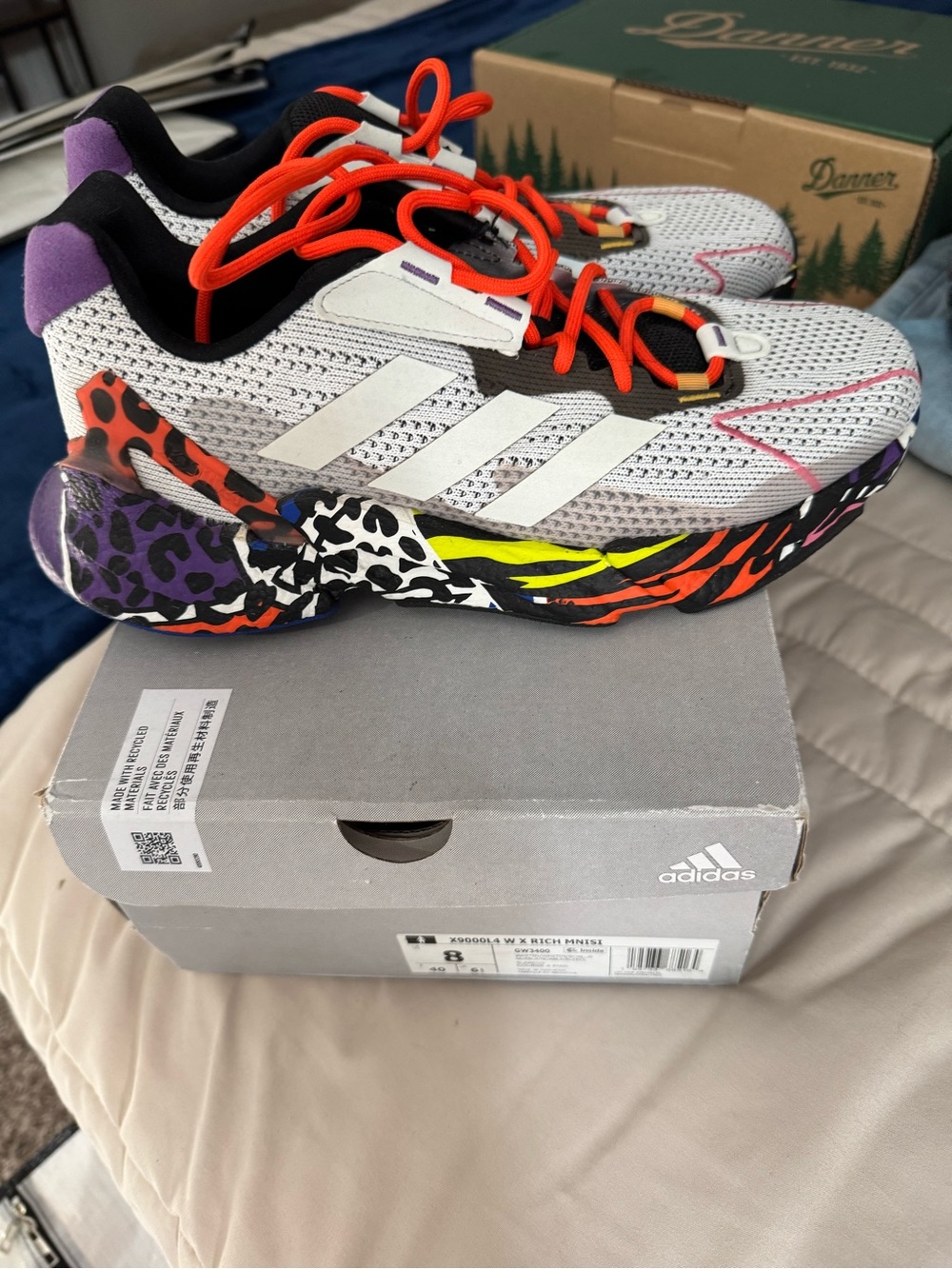 Adidas White Mesh Sneakers with Neon Orange Laces and Multicolor Animal Print.